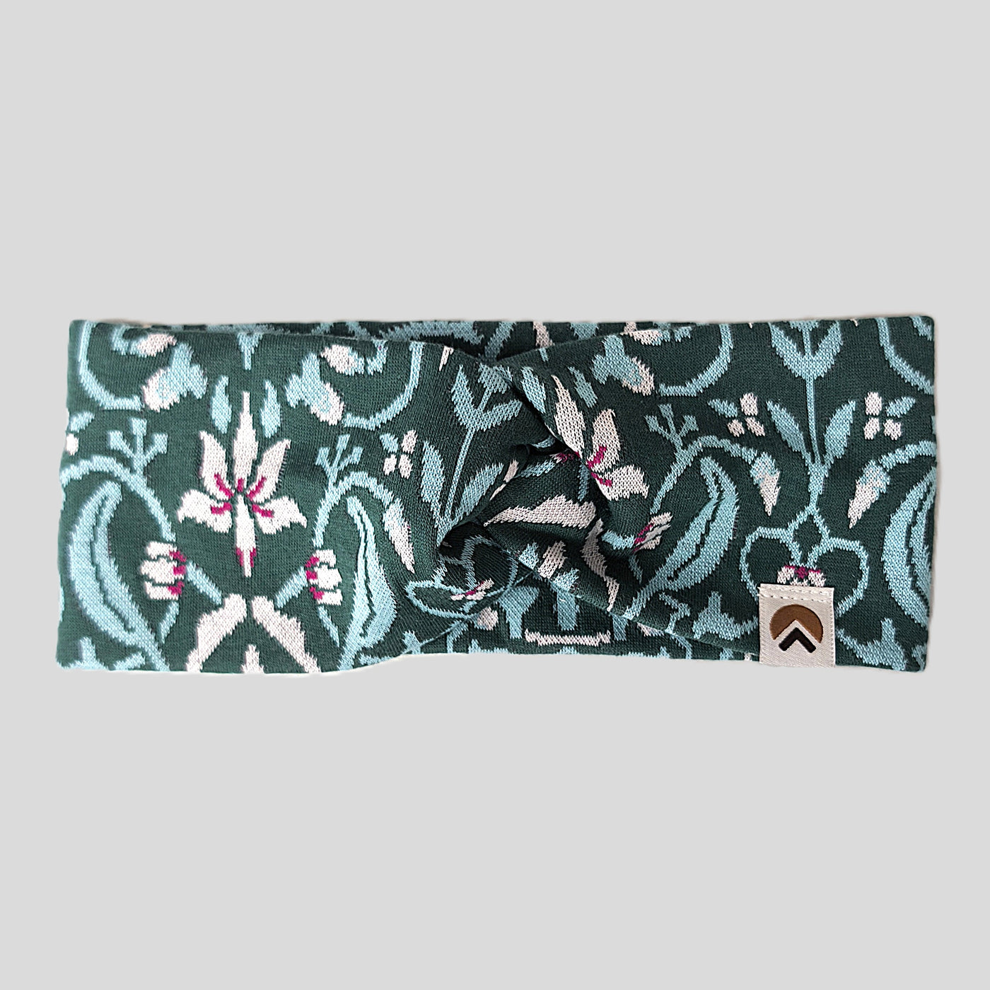 Stirnband, Blau- und Türkistöne Blumenmuster, in der Mitte über Kreuz